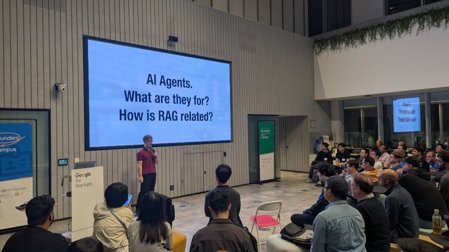 Adam Gibson presenting Kompile at Tokyo AI, title slide asking 'AI Agents. What are they for? How is RAG related?'